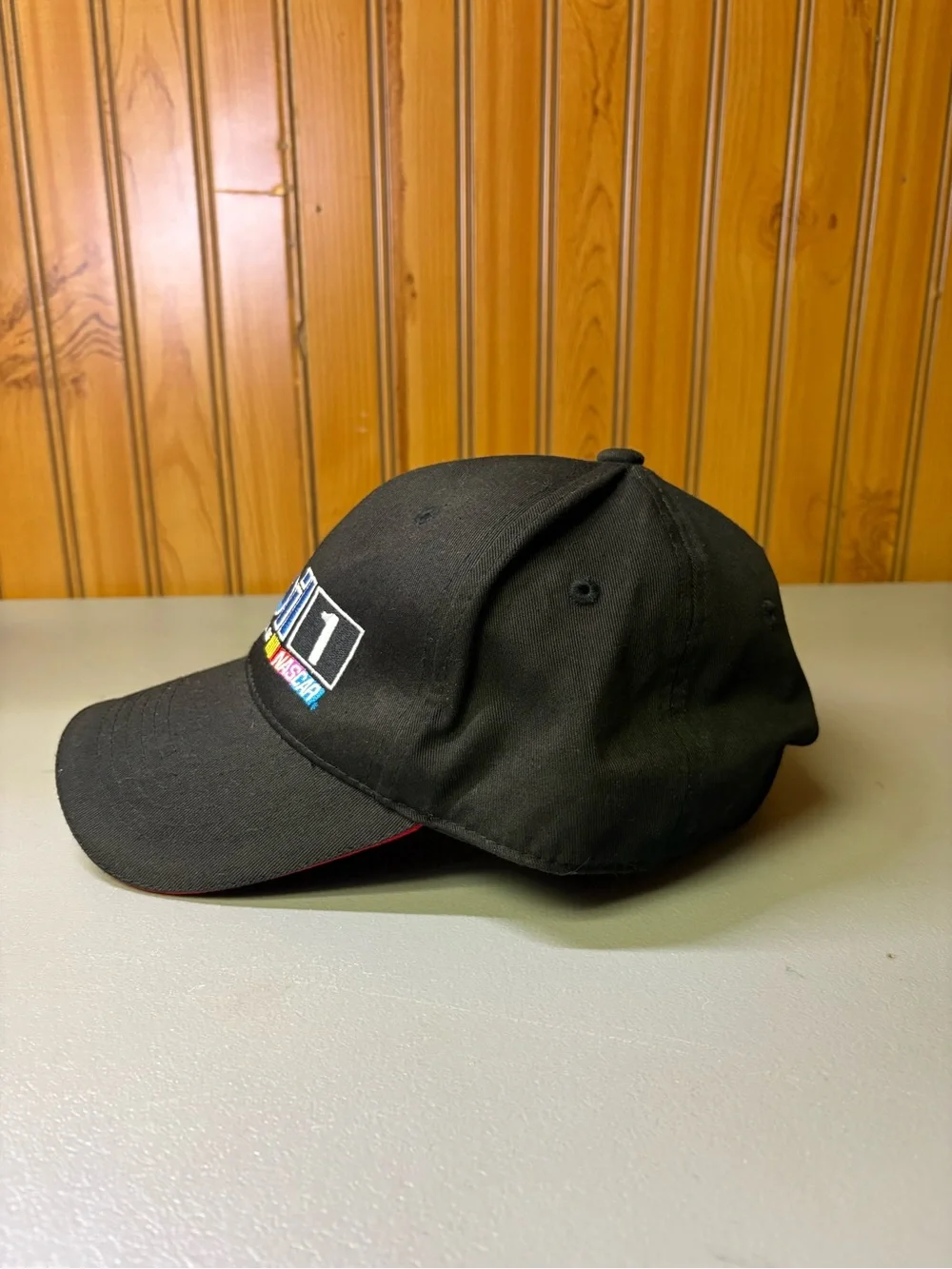 Chase Authentics Black Baseball Cap with Blue, Red and White Mobil 1 Logo